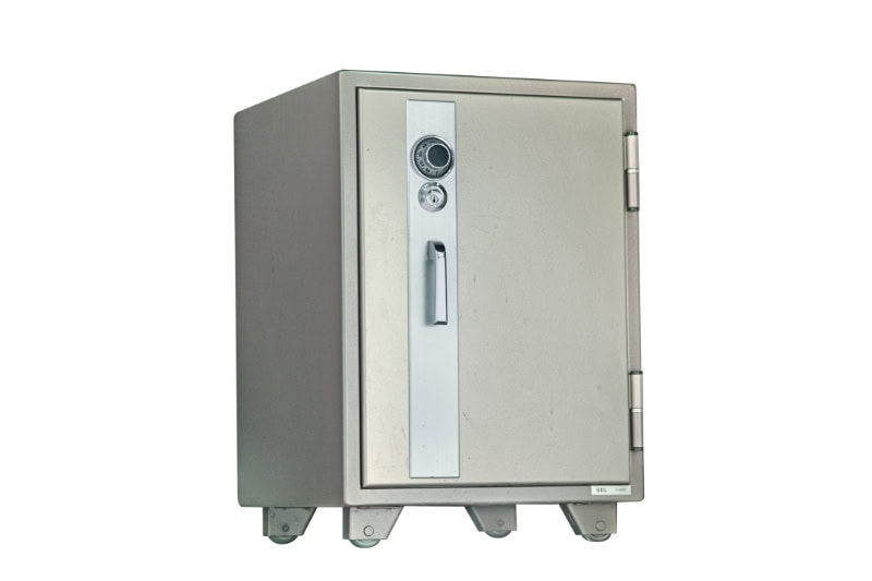 Do I Need a Separate Safe for Separate Items? Old iron safe isolated on white background.